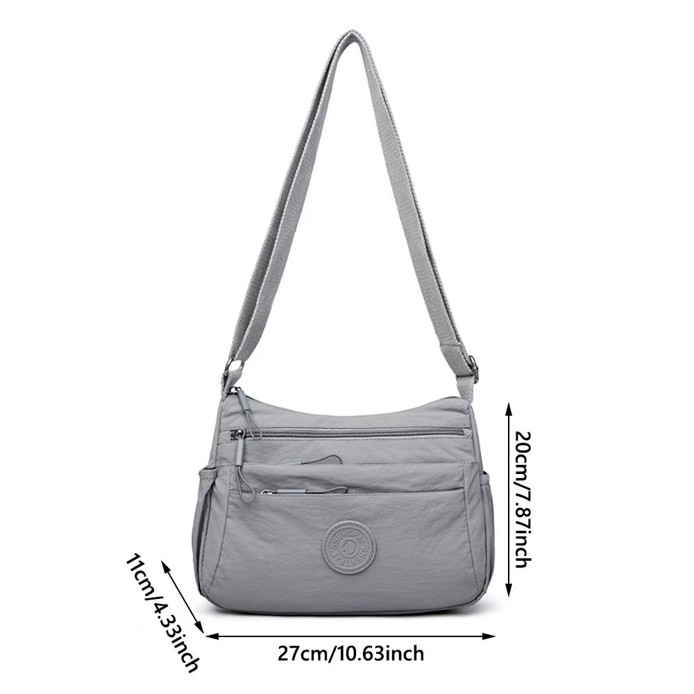 Bolso bandolera ligero de color sólido con varios compartimentos