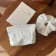 Bolsa impermeable blanca con encaje y cierre para viaje - imagen 5