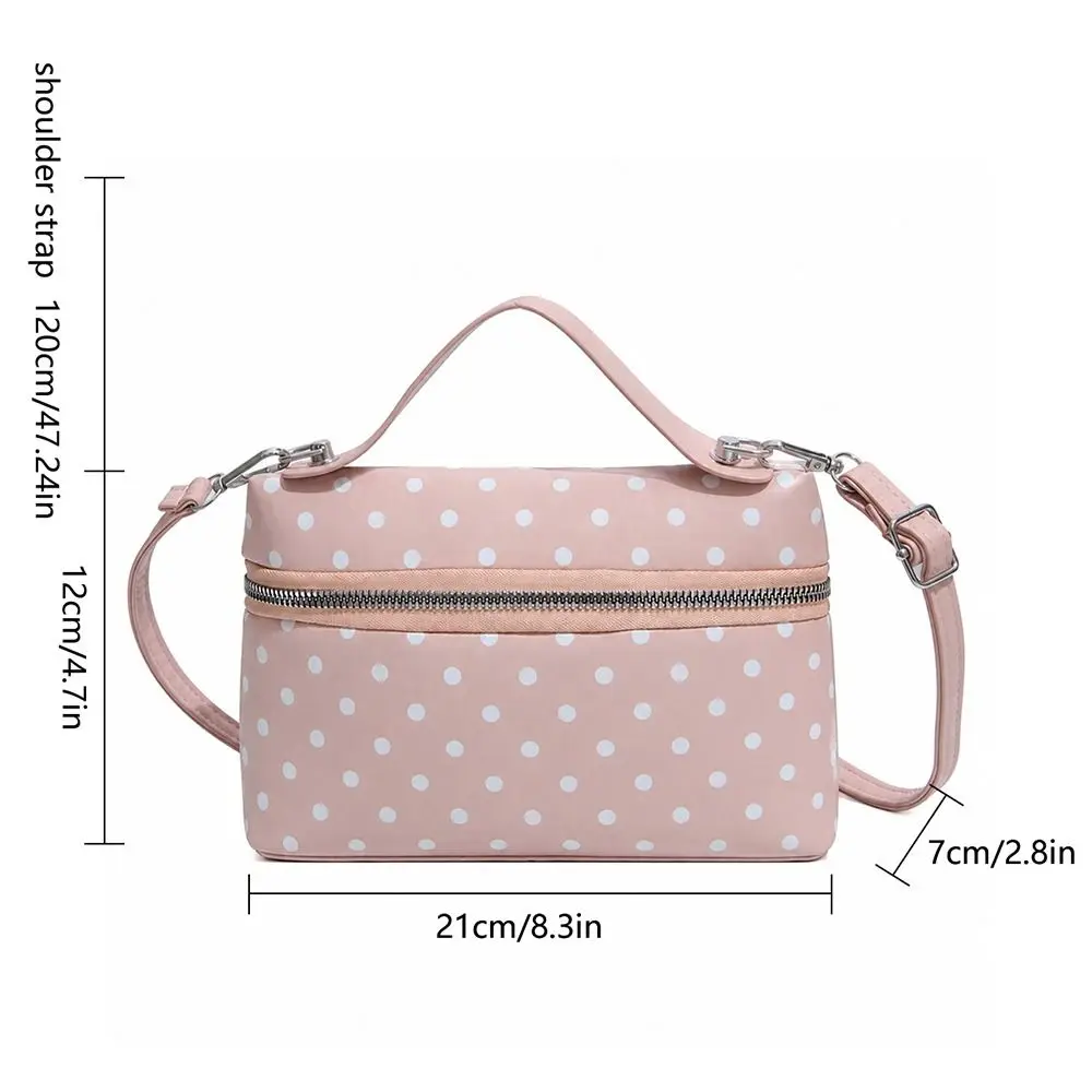 Bolso bandolera de lunares rosa