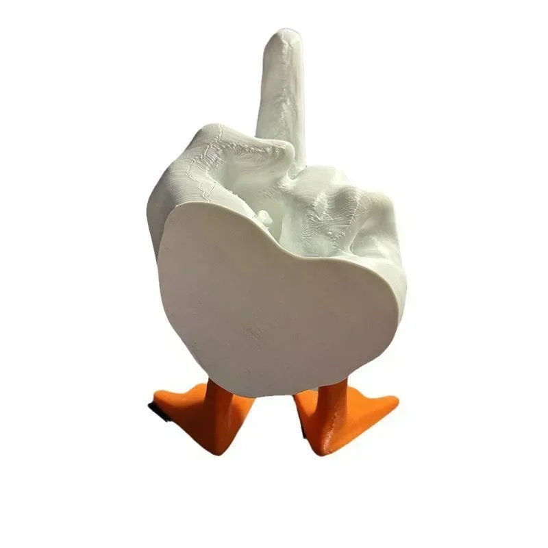 Comparativa del tamaño del pato en la mano, mostrando sus 17 cm de altura
