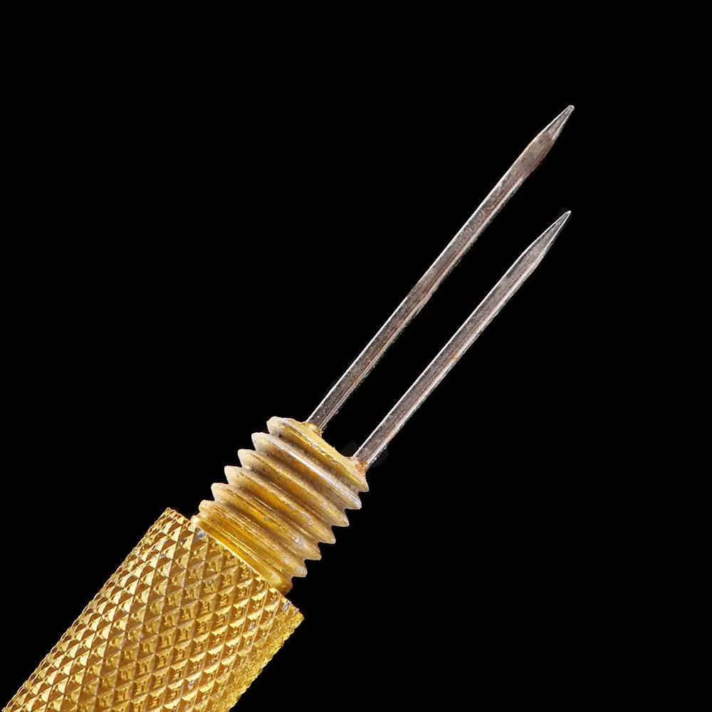 Detalle del agarre y mecanismo del extractor