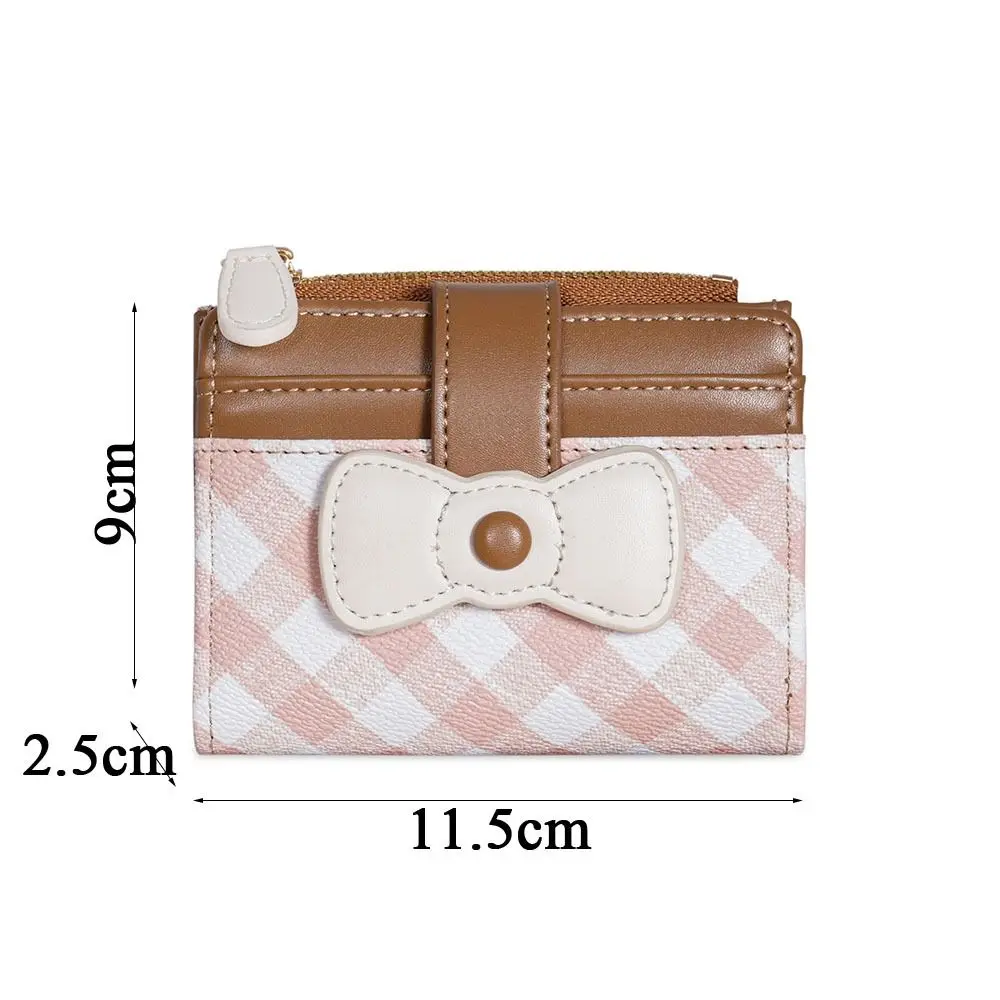 Cartera corta a cuadros con lazo y diseño compacto