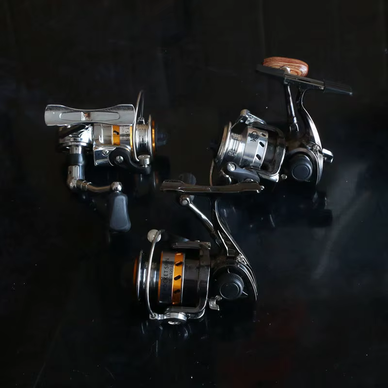 Carrete Giratorio Mini Metal – Para pesca en orilla e invierno - imagen 5
