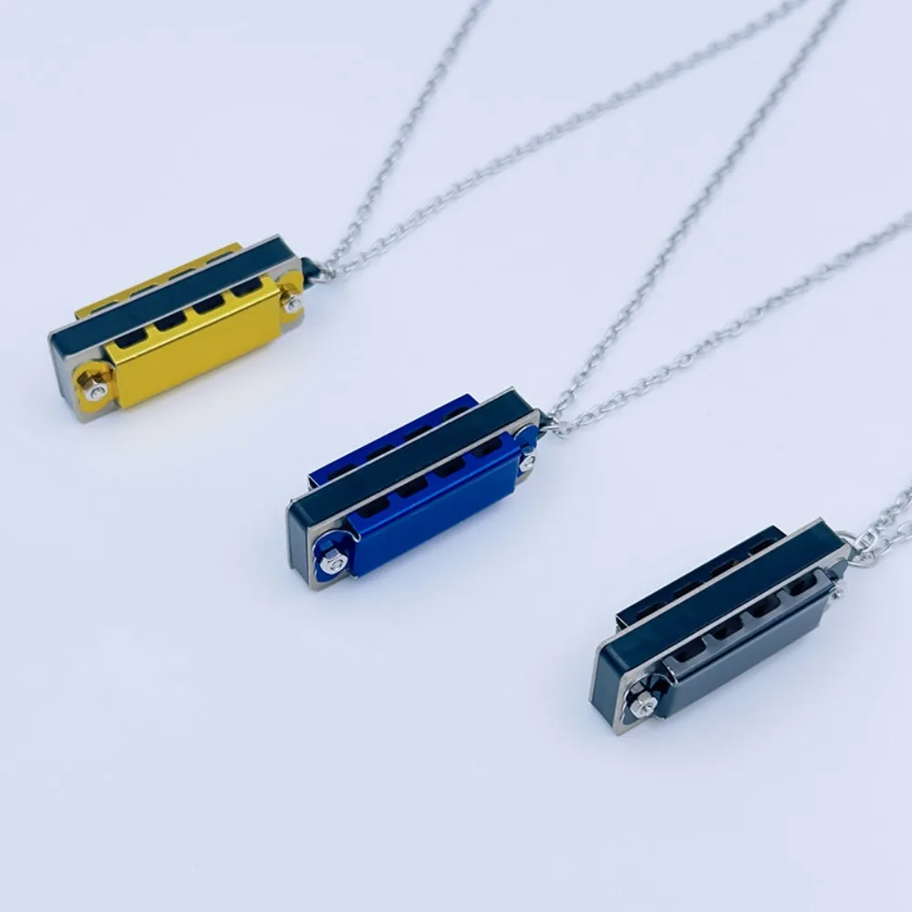 Armónica metálica mini con cadena y varios tonos - imagen 5