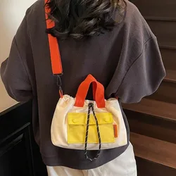 Bolso tipo cubo con cordón y bandolera ligera para móvil