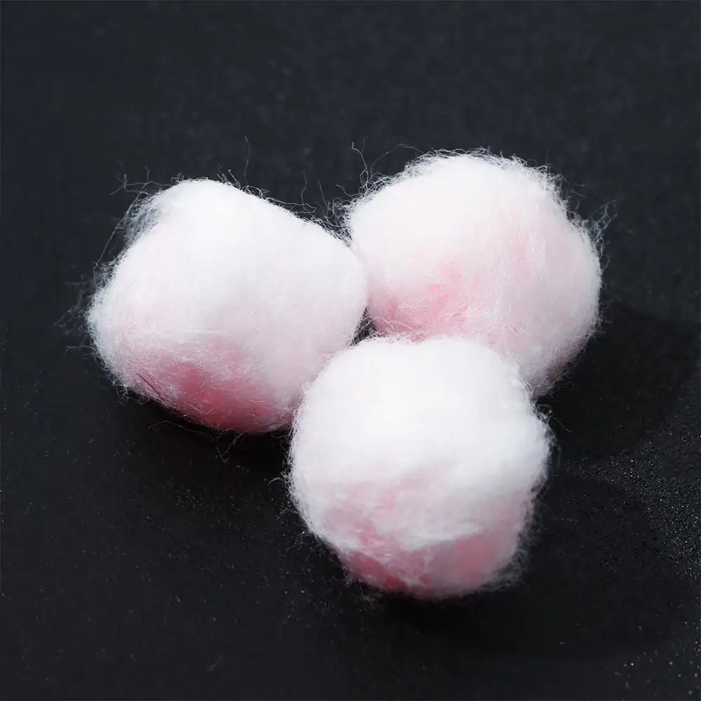 Tapones de algodón con cera en color rosa