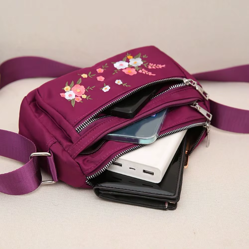 Bolso bandolera de nailon resistente al desgaste con detalles de bordado