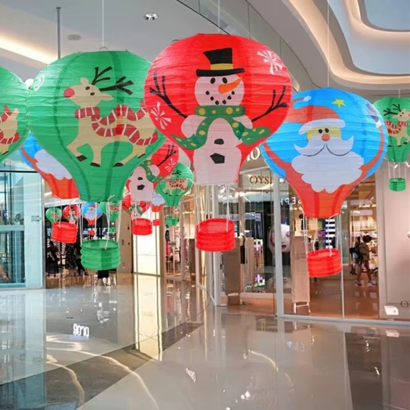 Farol de papel navideño con diseño de Santa Claus y reno