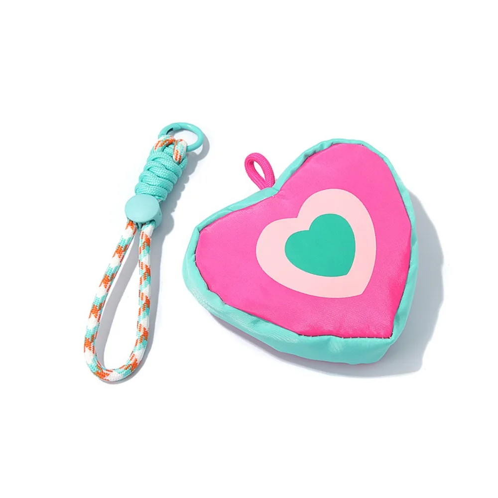 Bolsa pequeña en azul y rosa, fácil de llevar