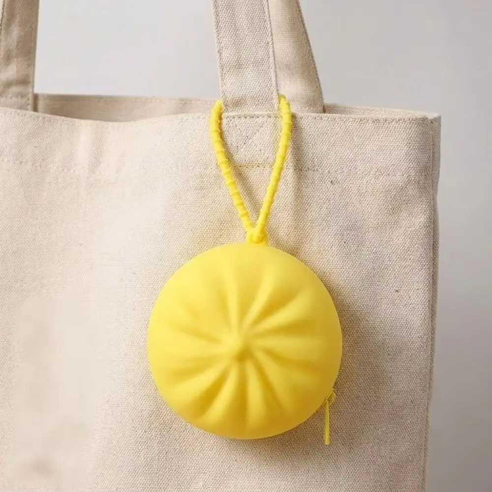 Monedero de silicona con forma de bollo y correa de muñeca - imagen 3