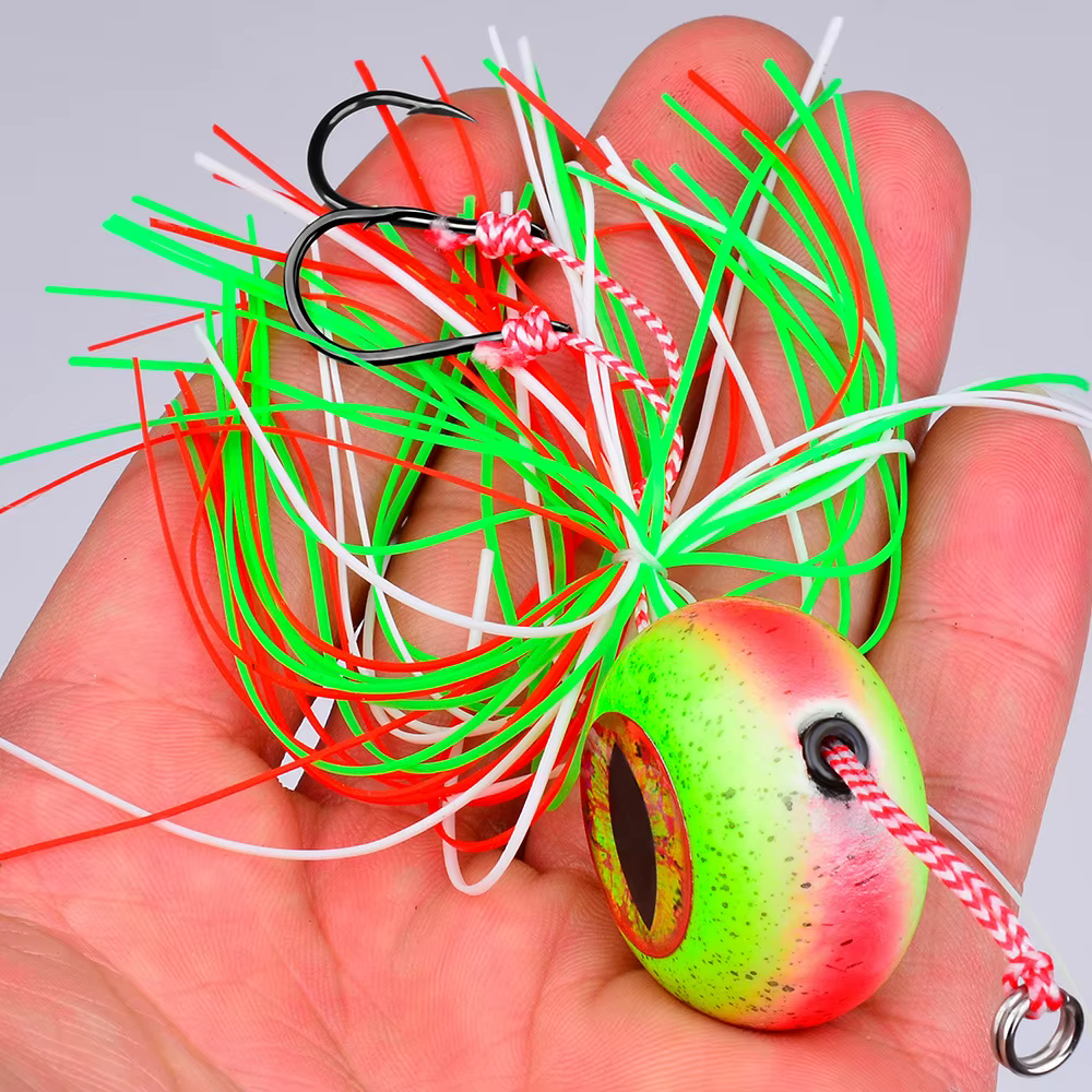 Señuelo Jigging con ojos 3D, cabeza plomo y faldas goma luminoso - imagen 4