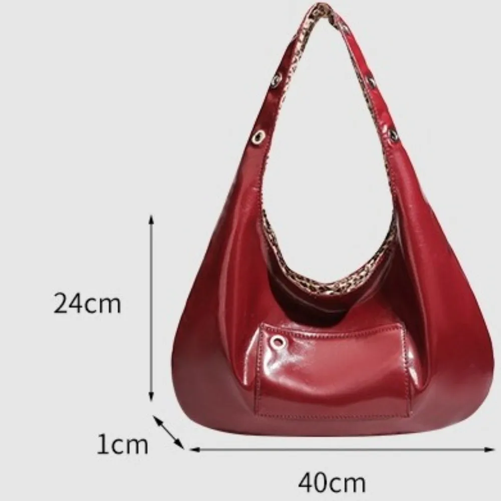 Bolso de mano de leopardo en tonos oscuros