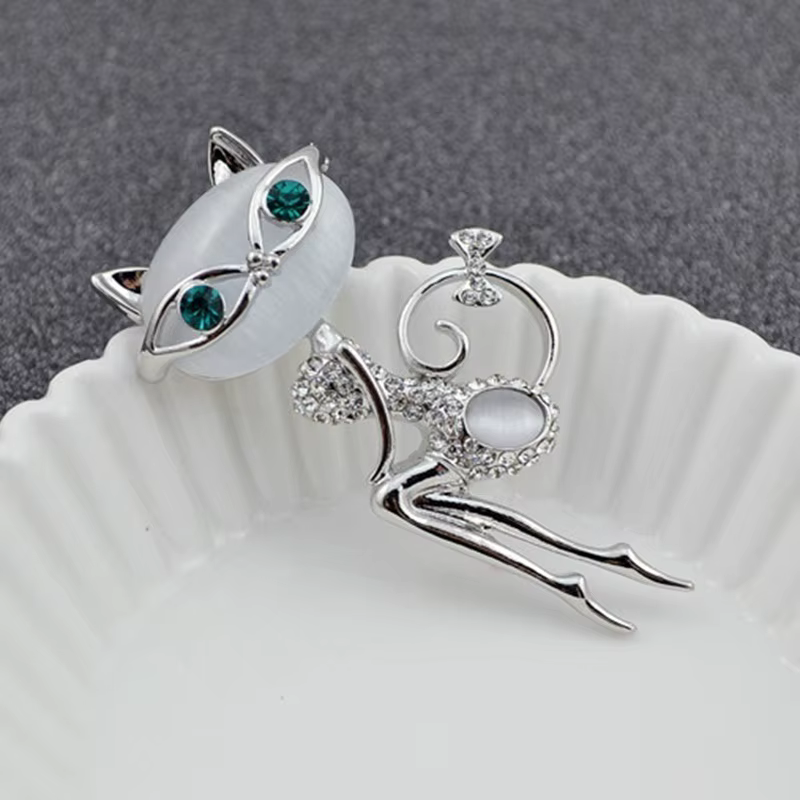 Broche de piedra ojo de gato packaging