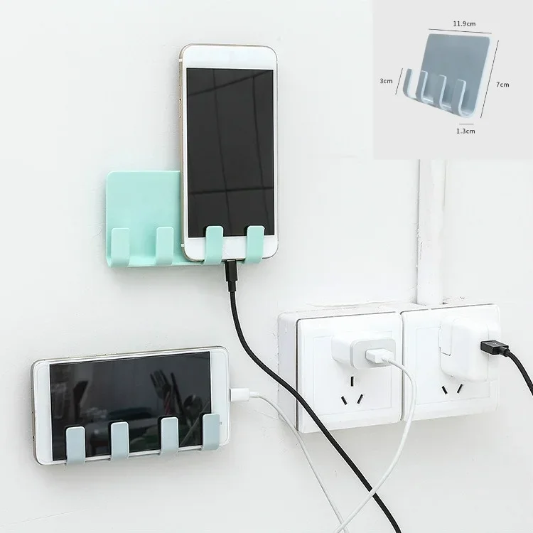 Soporte de pared para cargar el móvil con estante multifuncional
