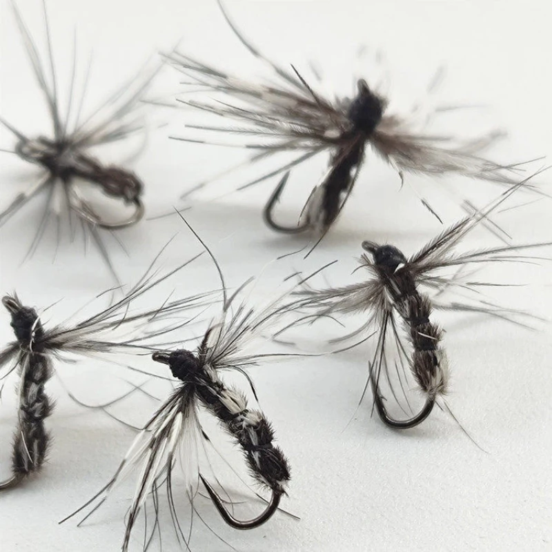 Anzuelos mosquitos imitación pluma negra plateados – alta captura