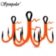 Spinpoler 3X Strong Anzuelo triple UV naranja con asistencia y púas