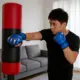Guantes de boxeo profesionales acolchado grueso medio dedo resistentes - imagen 5