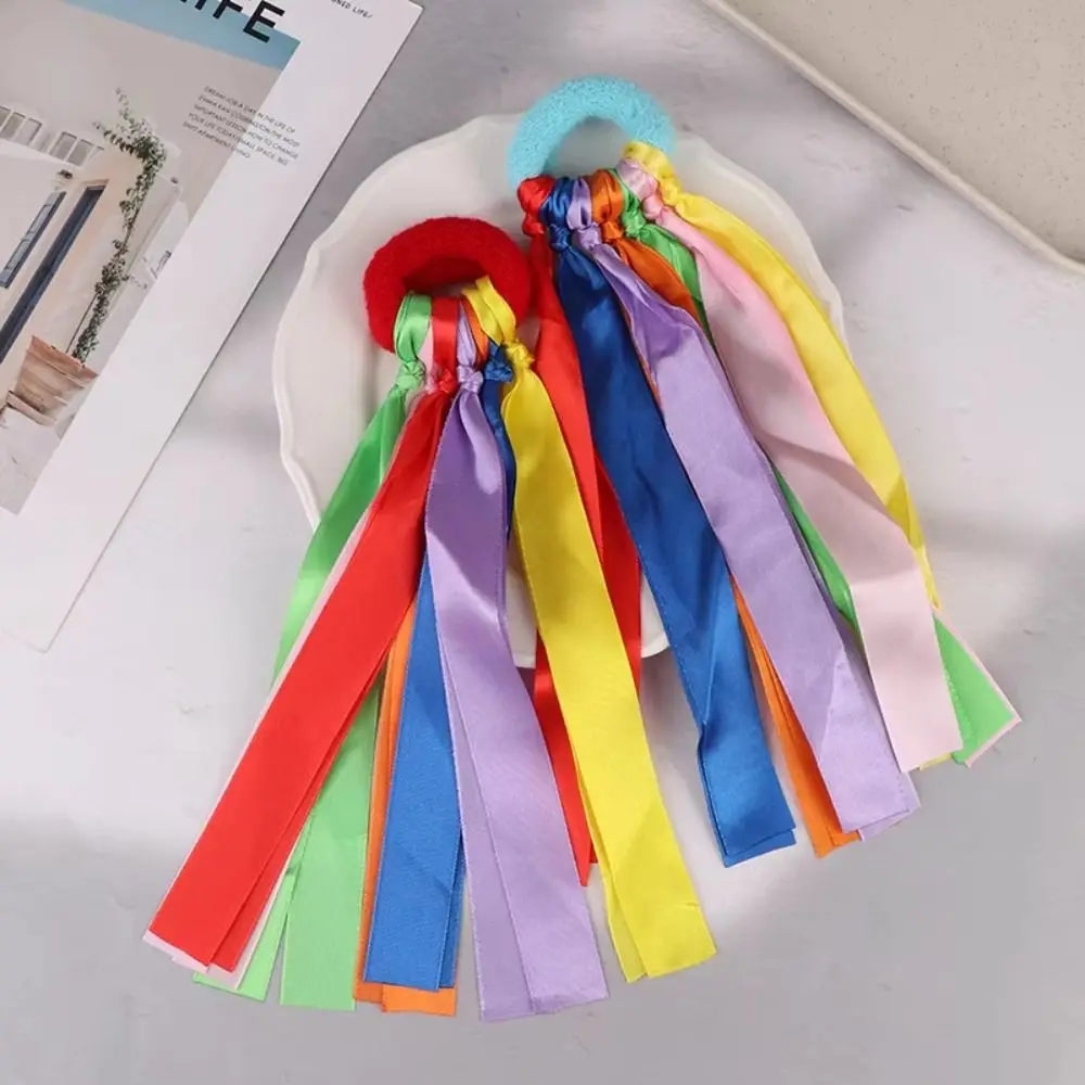 Pulsera elástica infantil multicolor con pompones grandes para baile - imagen 2