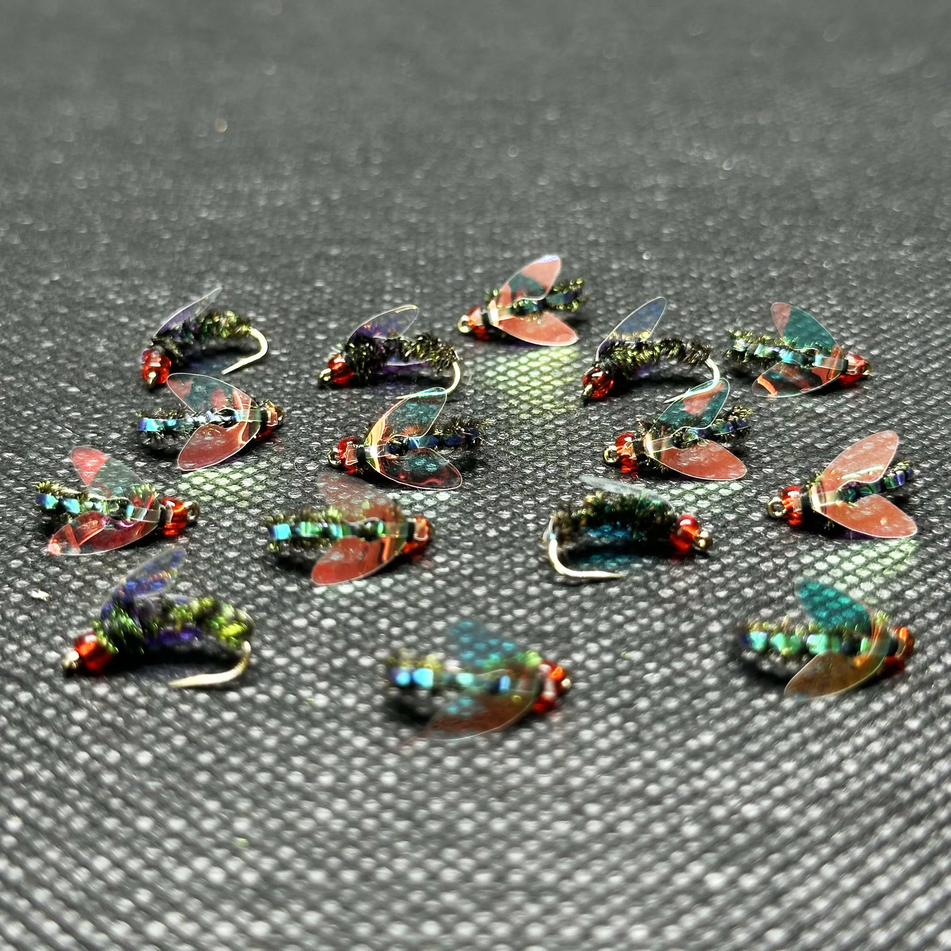 Detalle de diseño tipo mosca húmeda