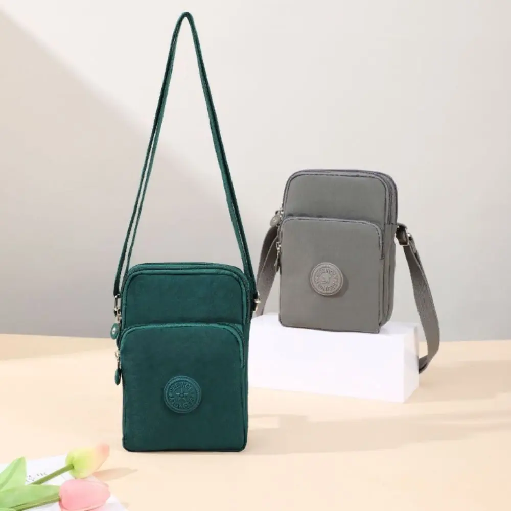Bolso bandolera impermeable de nailon con espacio para teléfono - imagen 2