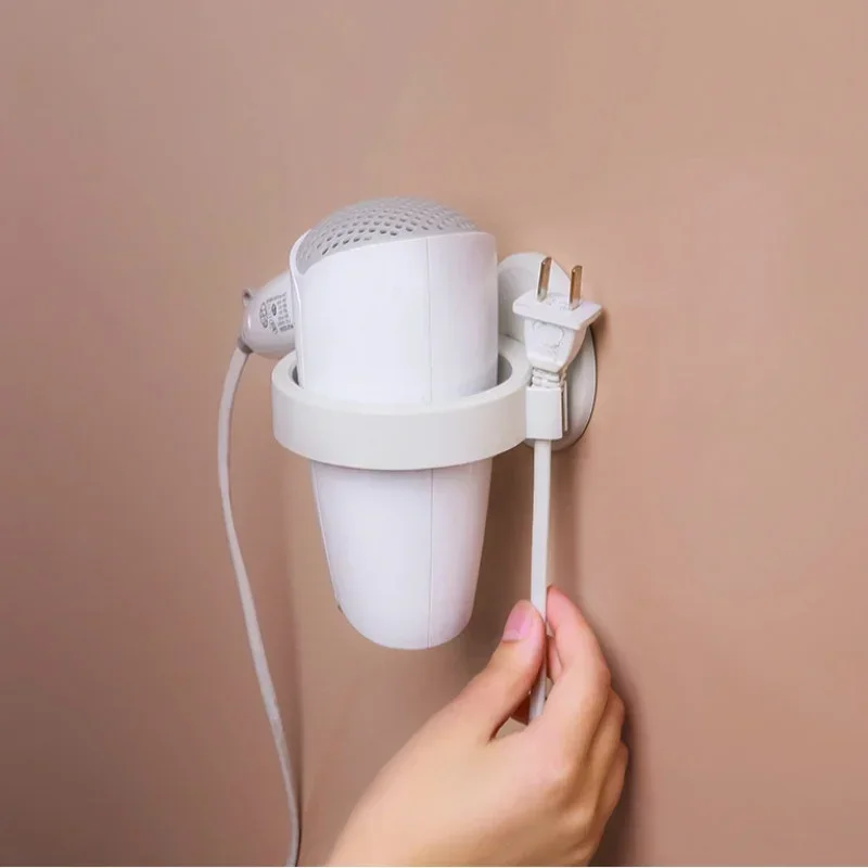 Estante de pared sin perforaciones para secador de pelo