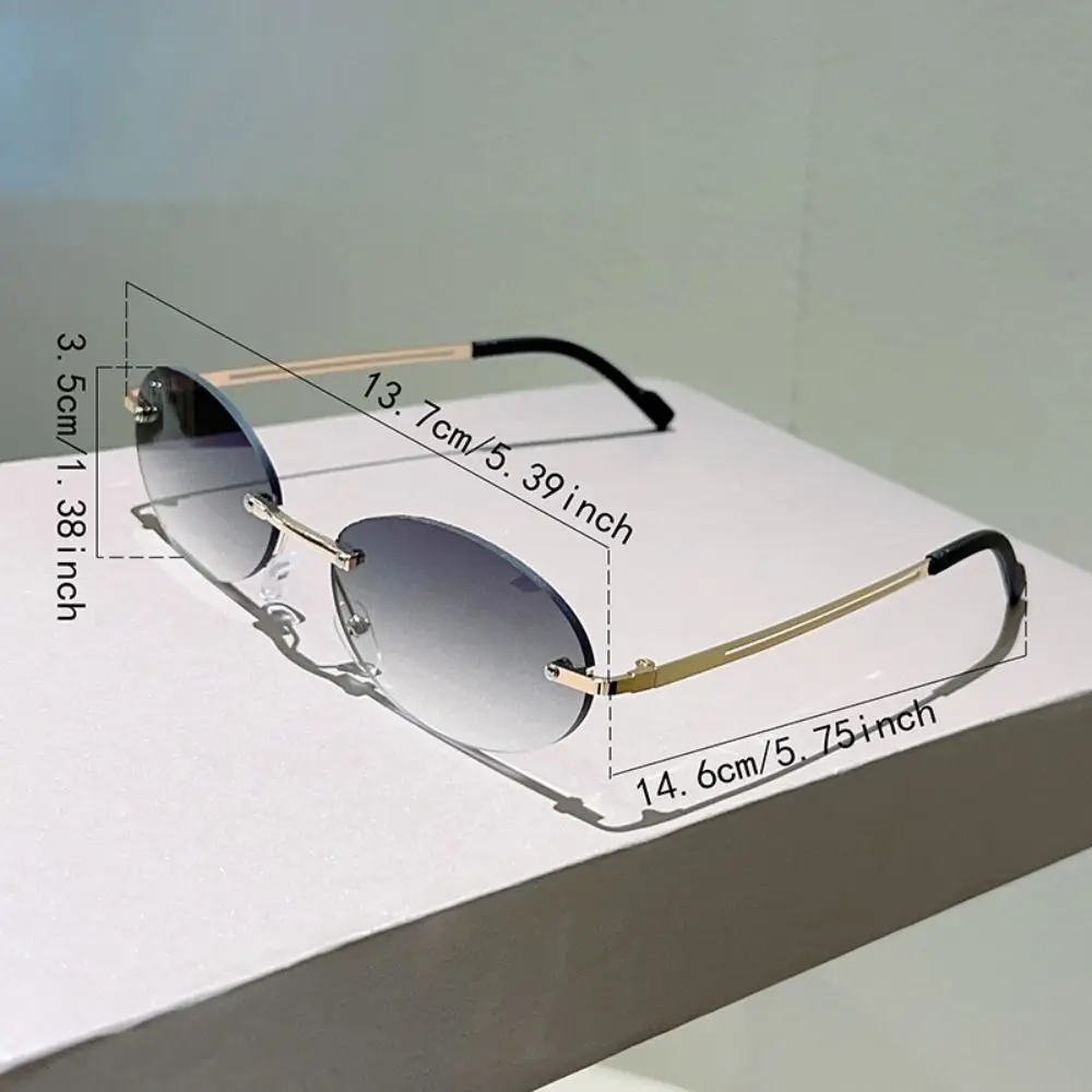 Gafas ovaladas sin montura, diseño clásico y lentes degradadas