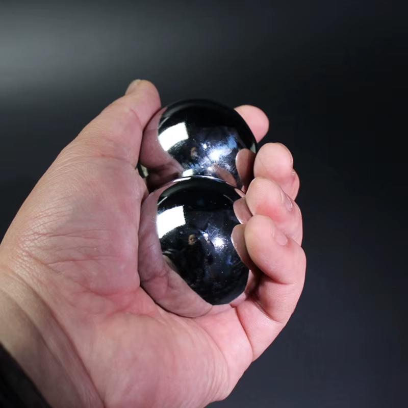Bola de masaje para manos - Esfera de hierro hueca para fitness - imagen 4