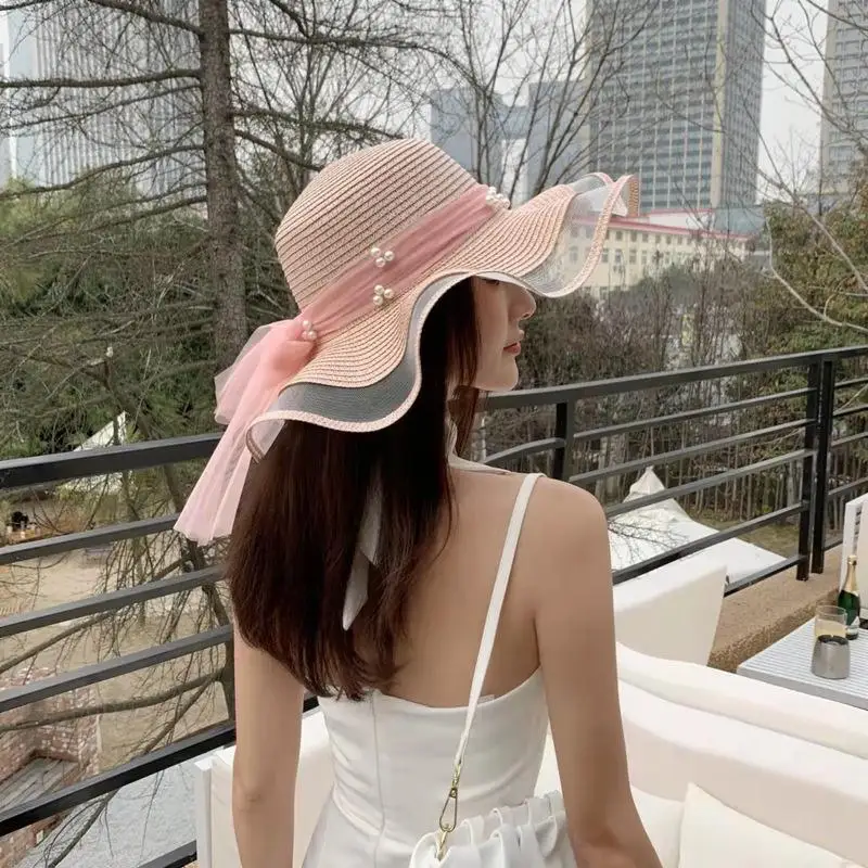 sombrero plegable de ala ancha para el sol con perlas de paja para niña