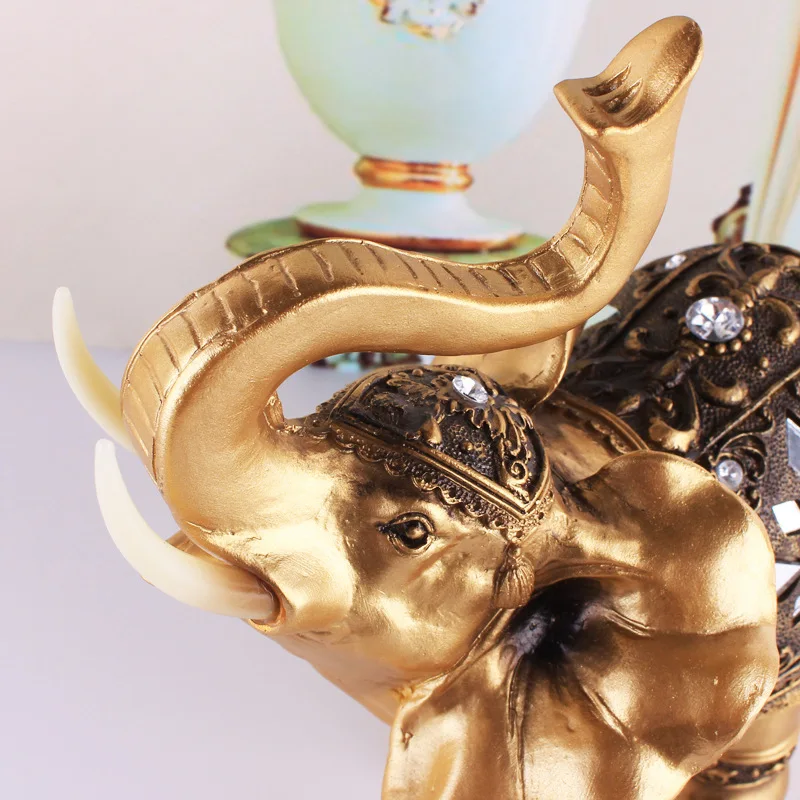 Decoración de pesca Estatua elefante dorada de resina Feng Shui