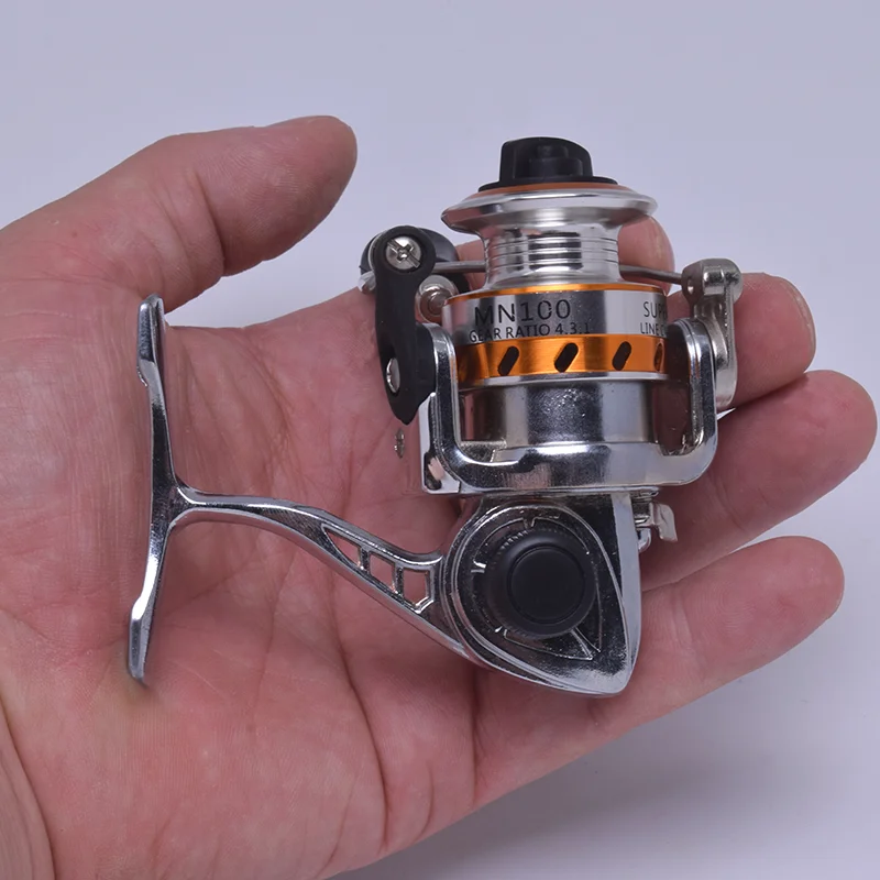 Carrete de pesca de metal con control manual