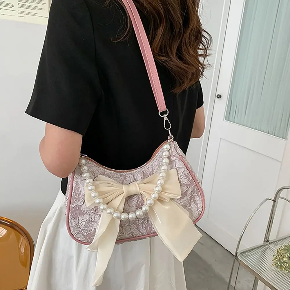 Bolso cruzado con lazo de mariposa