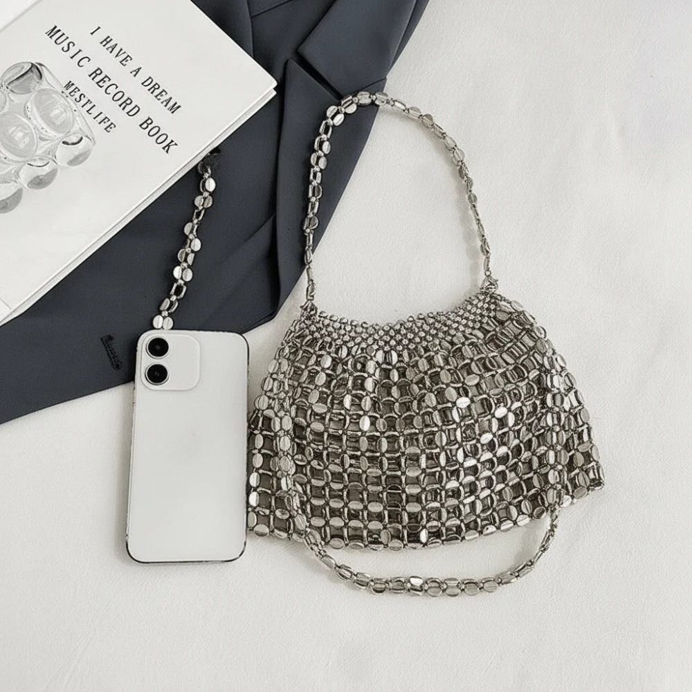 Bolso cruzado con cadena metálica suave