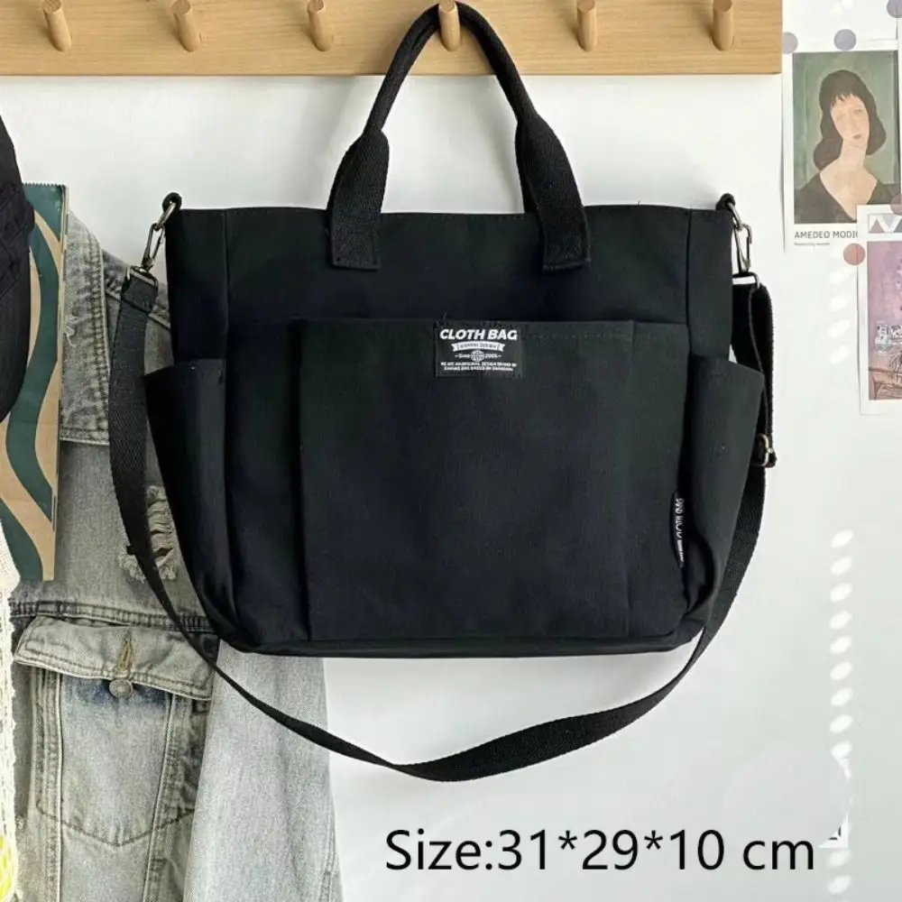 Bolso de lona en colores caqui, negro y beige