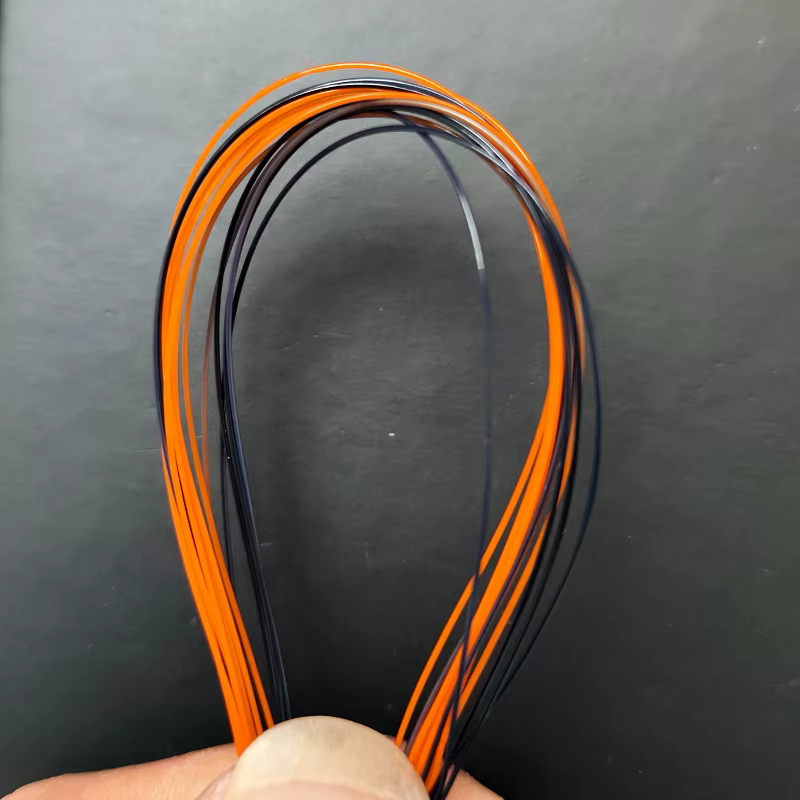 Sedal de pesca semiflatante doble color lima y naranja para mar