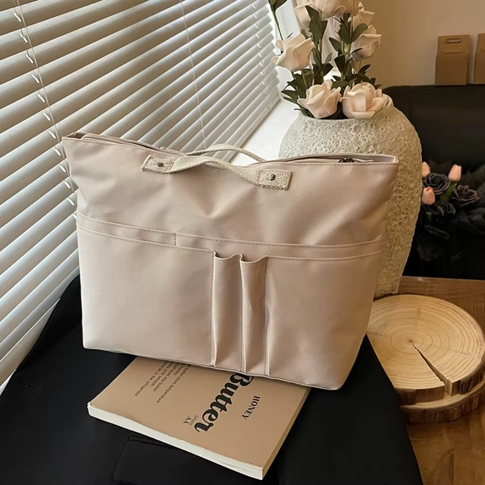 Organizador de bolso con múltiples compartimentos interior