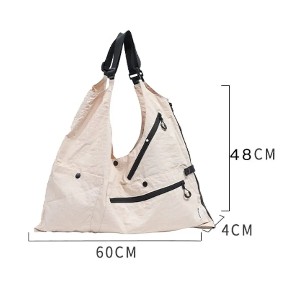 Bolso chaleco convertible de nailon con bolsillos