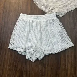 Traje de baño manga larga suelto con protección solar y ganchillo