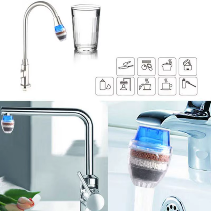 Filtro purificador de agua junto a grifo de cocina