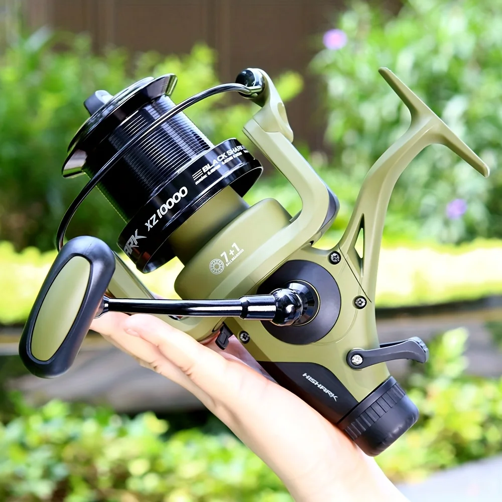 Carrete de pesca BAKAWA vista lateral con detalles del rotor