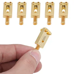 Soportes trémolo metálicos dorados con resorte y tornillos