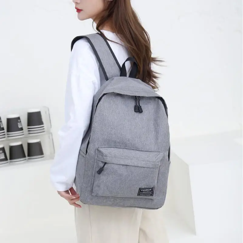 Mochila de tela Oxford en color negro y gris