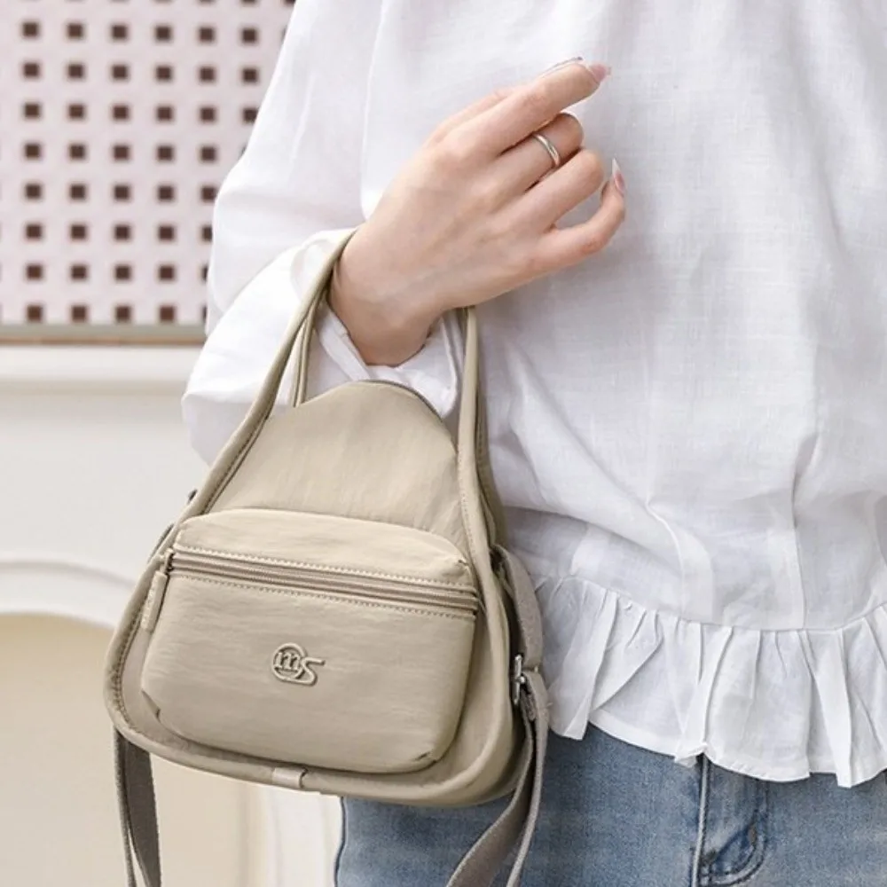 Bandolera crossbody ligera Advanced Sense para niñas y damas