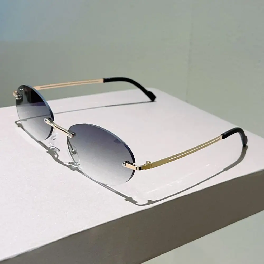 Gafas de sol ovaladas sin montura con lentes degradadas UV400 - imagen 4