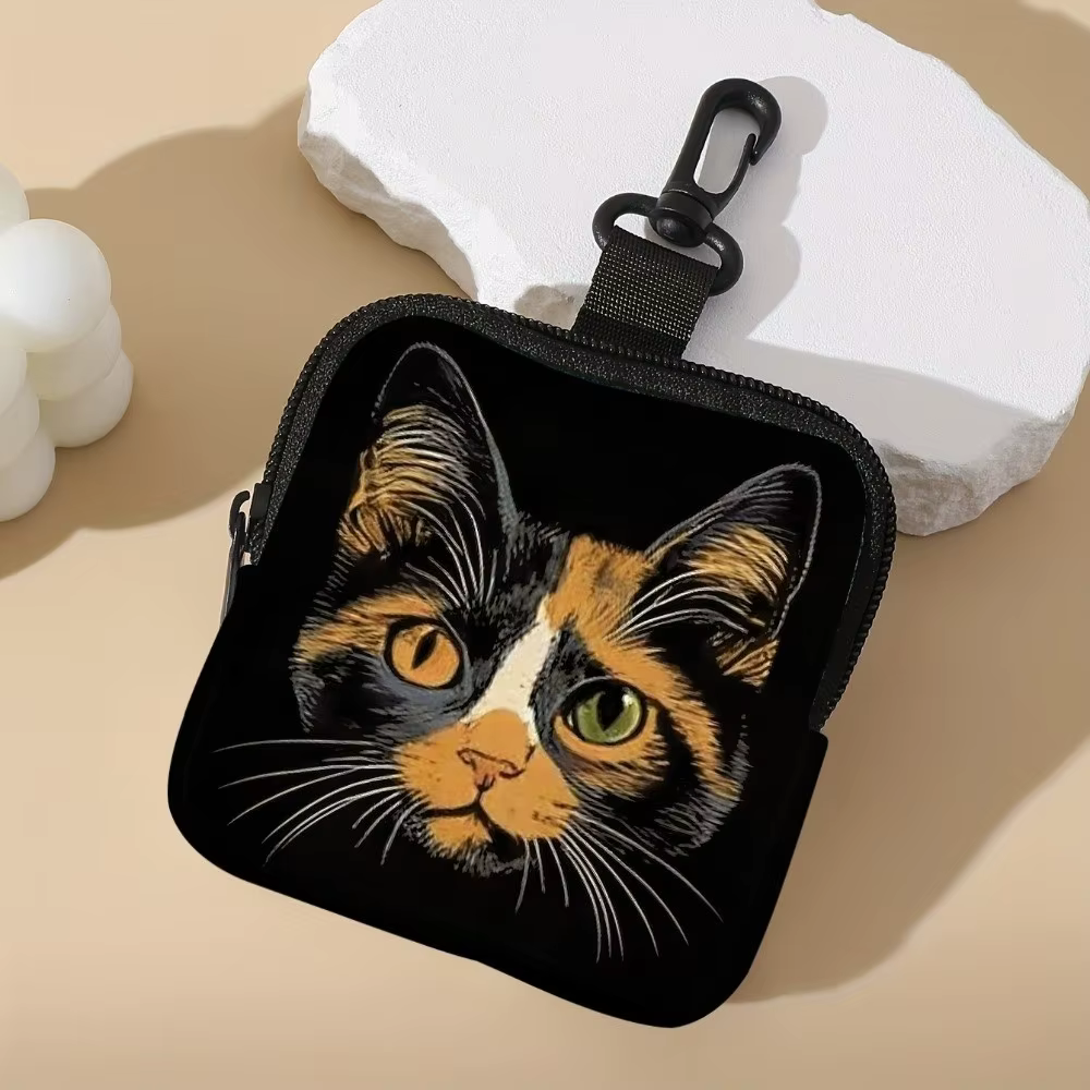 Monedero con diseño de gato en uso