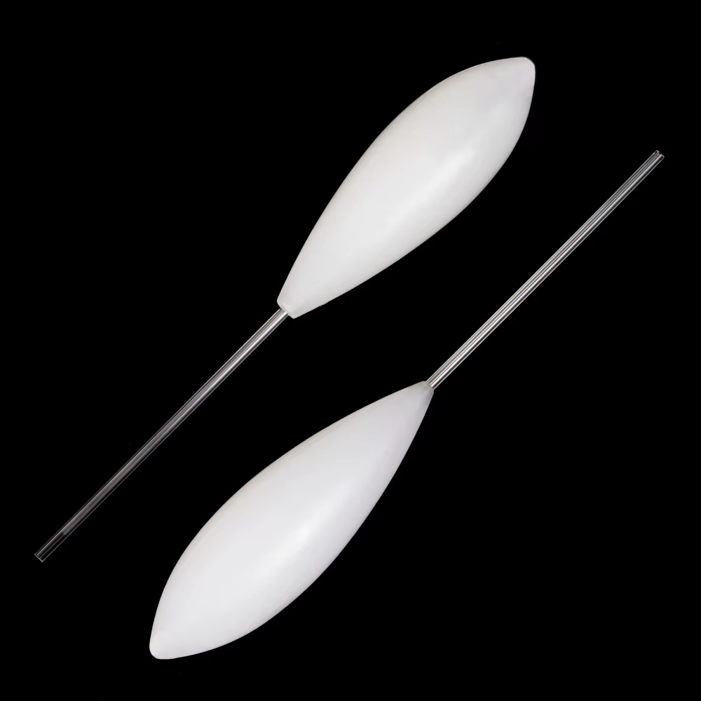 Pack de 5 flotadores de pesca blancos sobre superficie