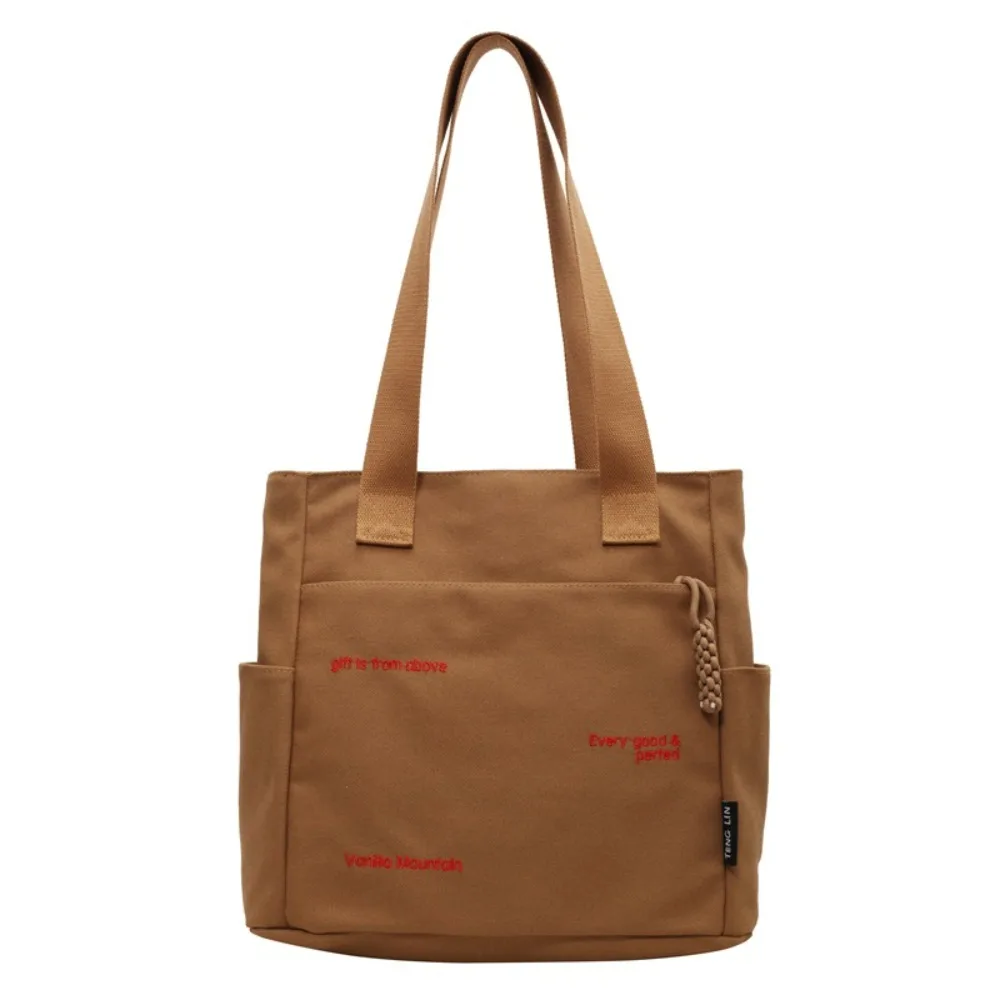 Bolso de hombro de lona con forma cuadrada