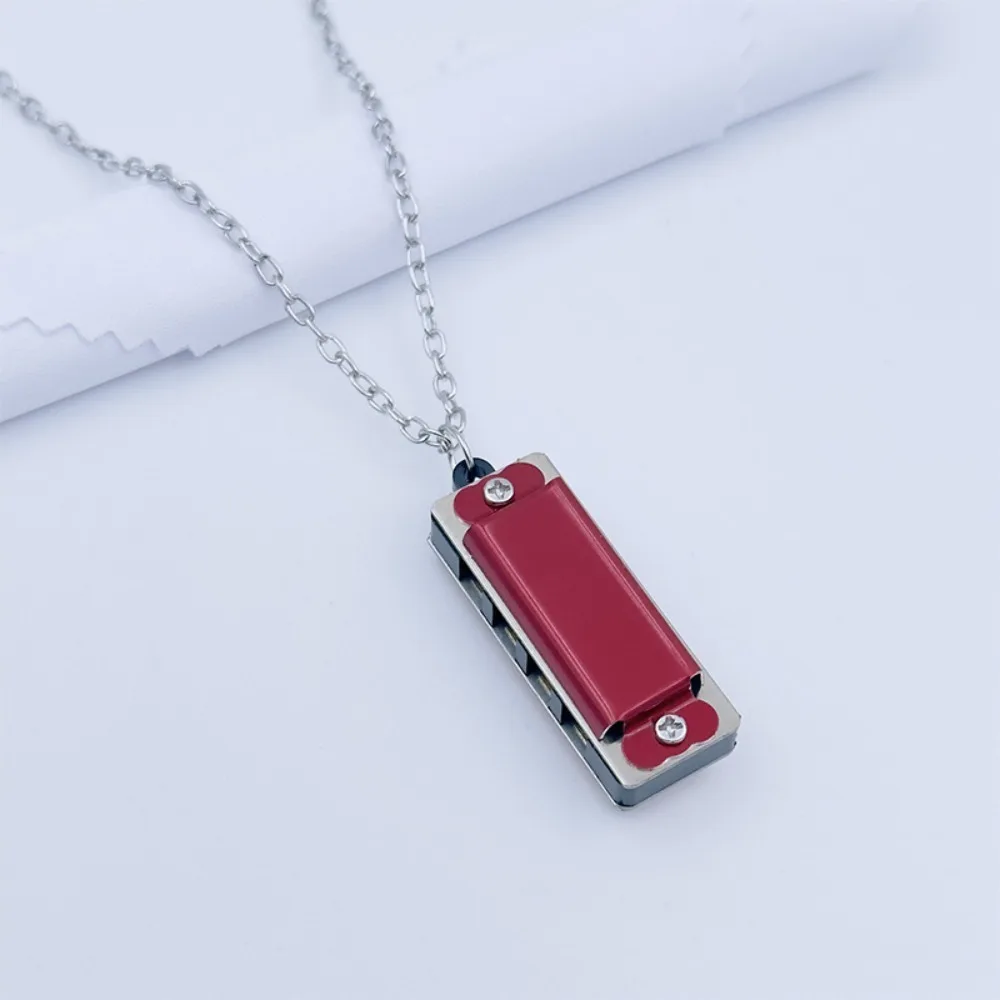 Armónica metálica mini con cadena y varios tonos - imagen 4