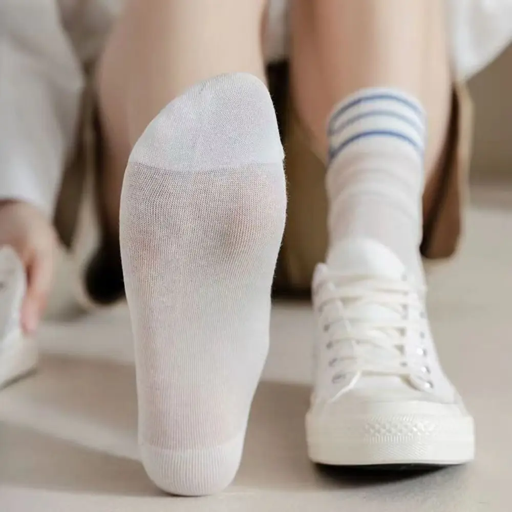 Calcetines en gris y blanco