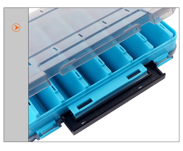 Interior de la caja con celdas para diferentes tamaños de anzuelos