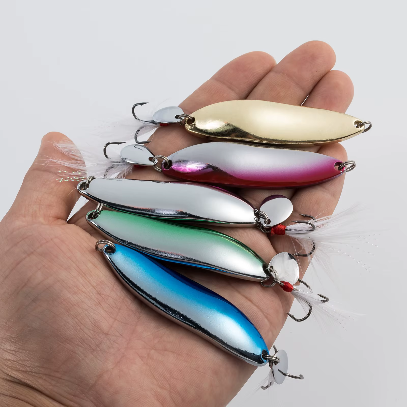 Spinner 21g con anzuelos triples y plumas para lubina y trucha - imagen 2
